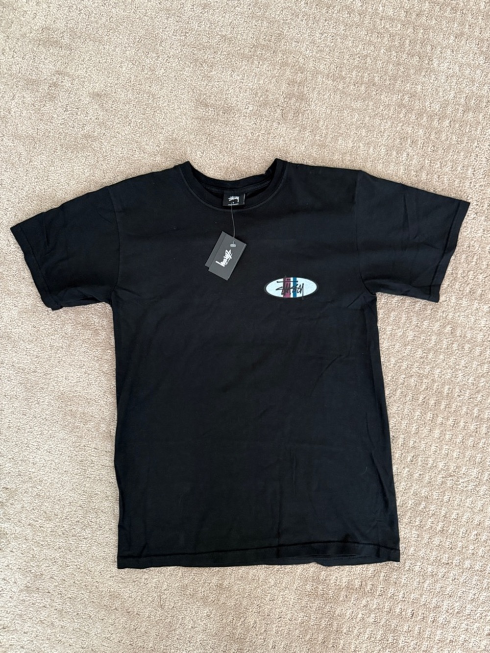 Stussy Black Tee with Small Multicolor Oval Logo